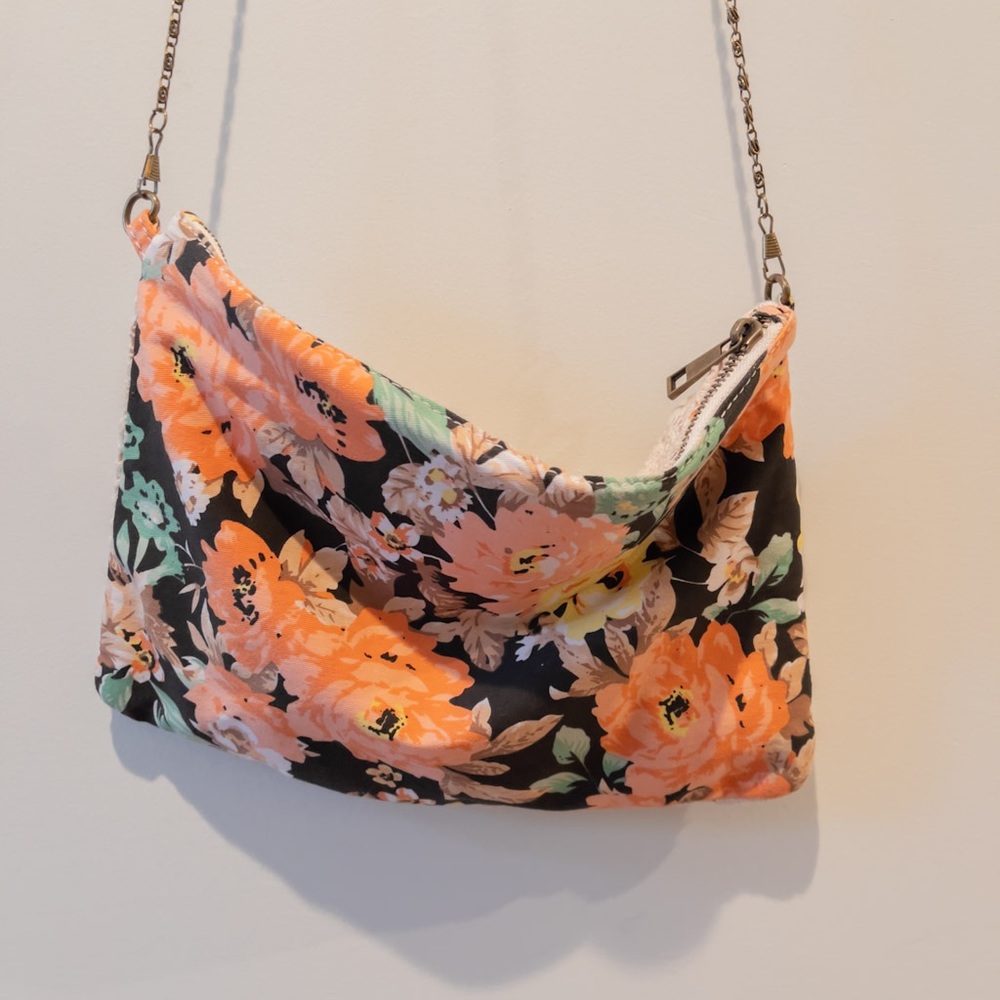 Francesca’s floral and lace crossbody purse